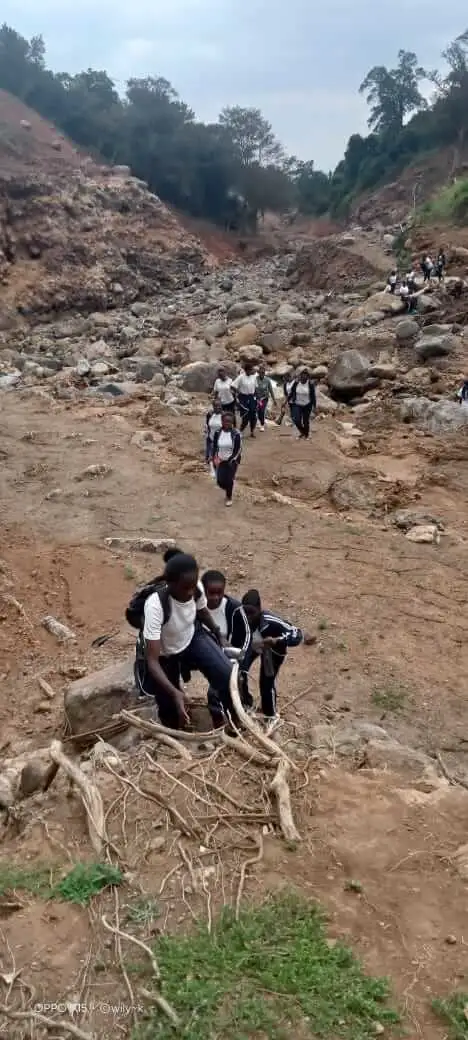 Guided hikers enjoying a walk along the river at Kijabe Hills