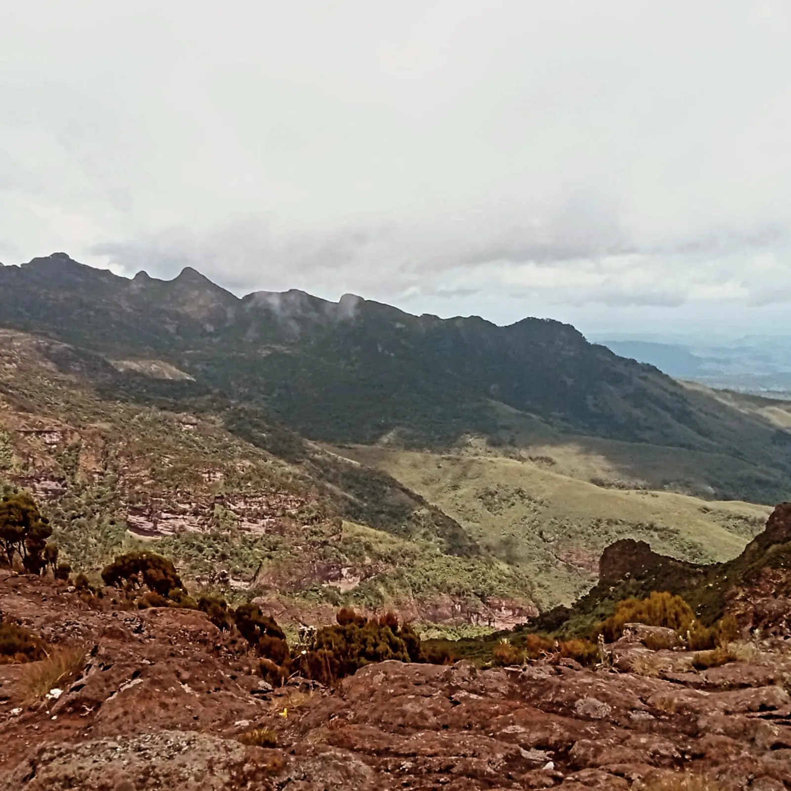 Hikers walking along the Mount Longonot crater rim near Nairobi, Kenya